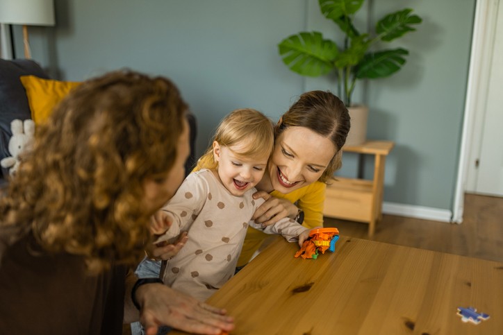 Mother and Her Little Son with a Child ABA Therapist