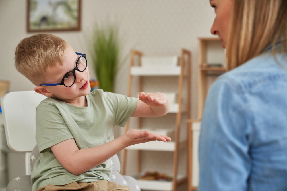 Little Boy and Therapist in the Classroom